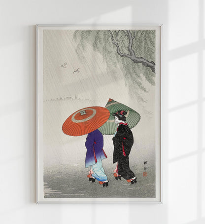 Dos mujeres bajo la lluvia de Ohara Koson