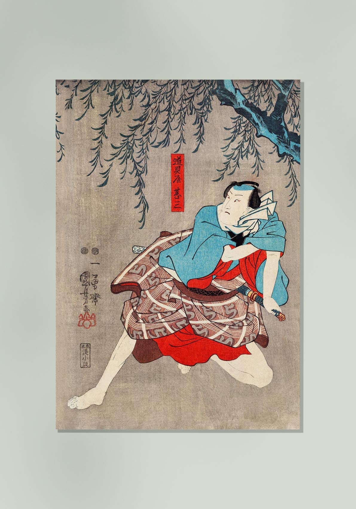 Samurai con kimono azul de Utagawa Kuniyoshi